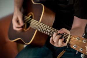 man playing guitar